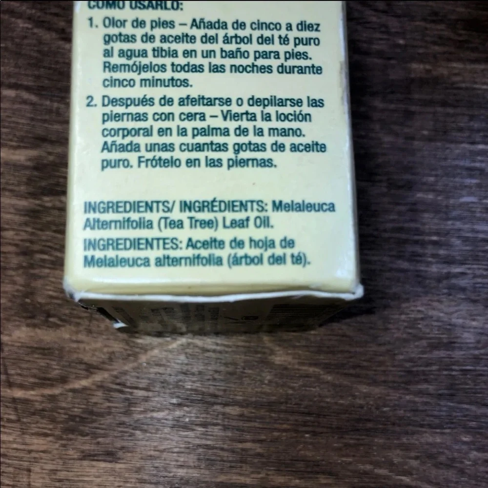 Pure tea tree oil in glass bottle